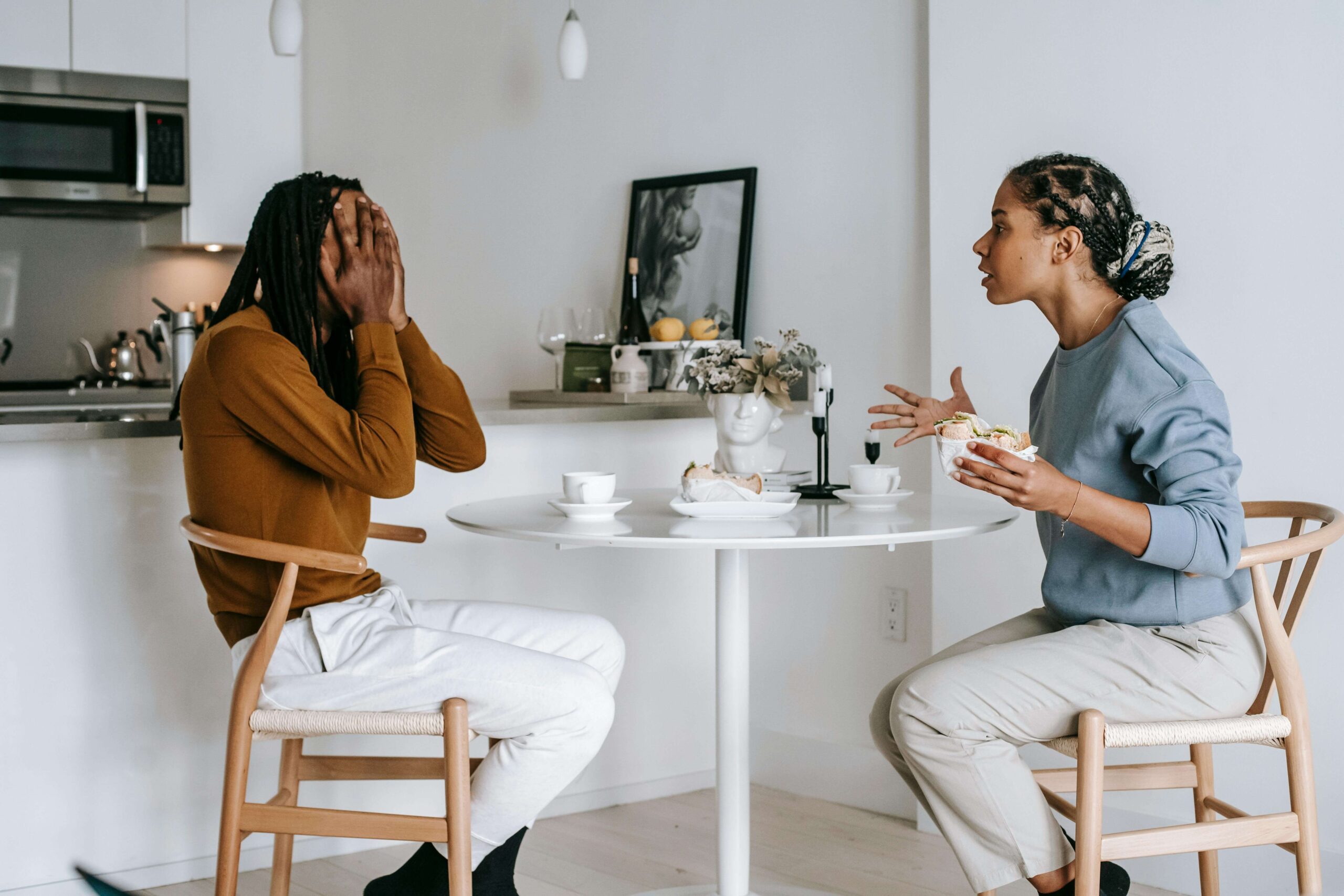 Couple having a disagreement, illustrating challenges addressed in individual relationship counseling for people pleasing in Denver, CO.
