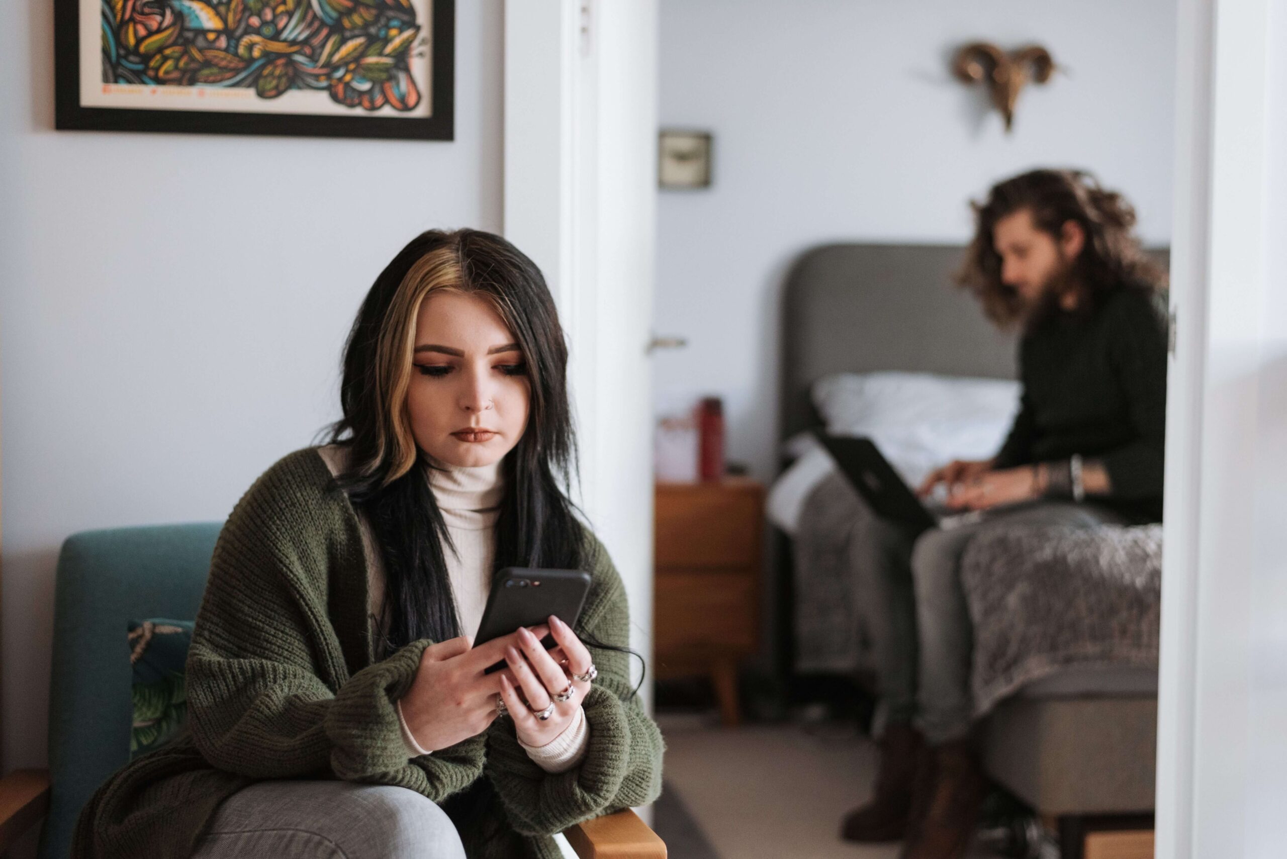 Emotional Distance - validation in a relationship denver co - validation in relationships denver co - therapy for validation in relationships denver co - colorado Distant couple sitting apart, representing feelings of being unseen or emotionally disconnected in a relationship and concerns addressed through individual relationship counseling in Denver, CO.