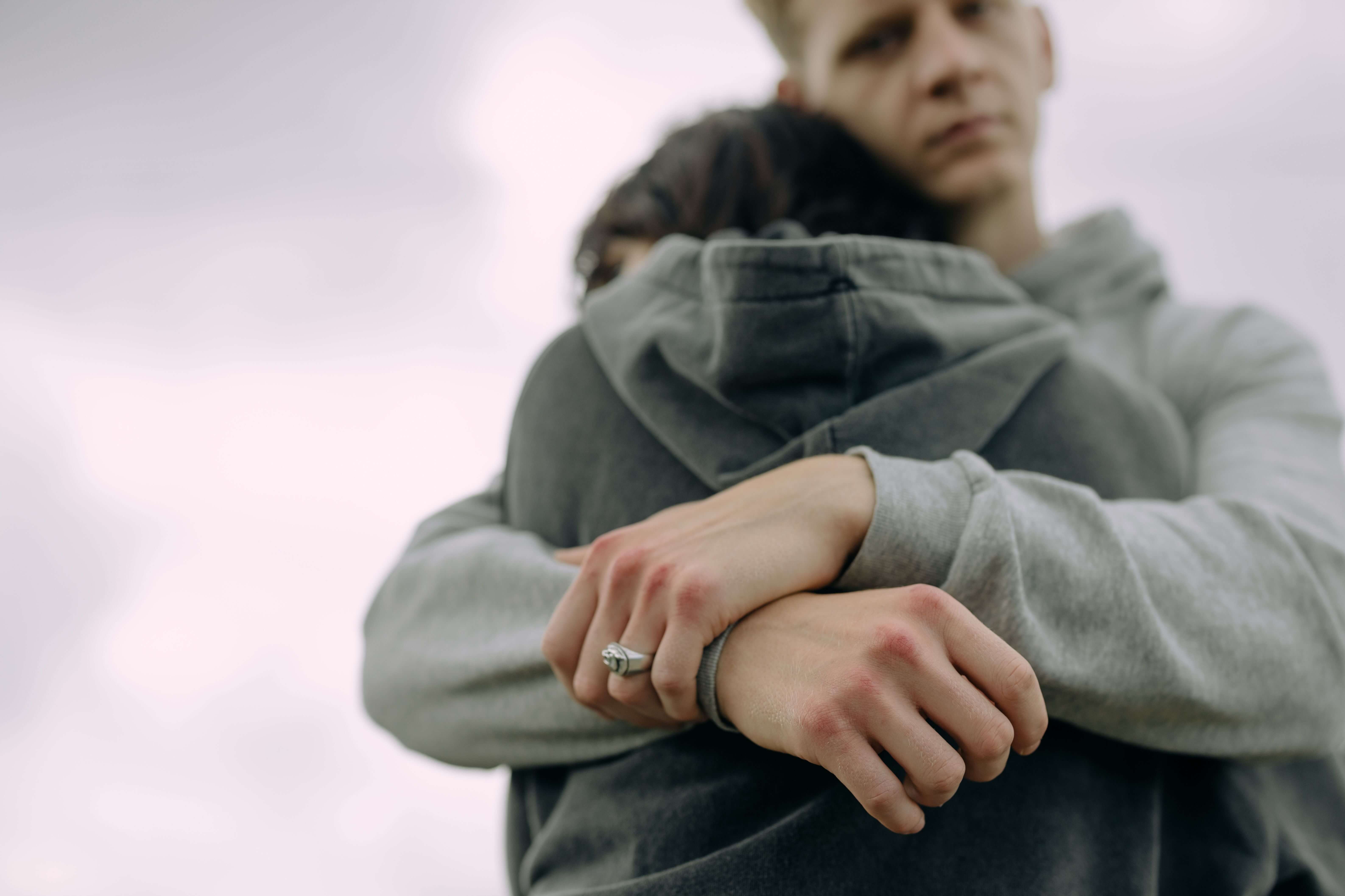 Rebuilding Connection - validation in relationships denver co - individual relationship counseling denver co - therapy for validation in relationships denver co - colorado Close-up of a man hugging a woman, symbolizing emotional support, reassurance, and healthier validation in relationships in Denver, CO.