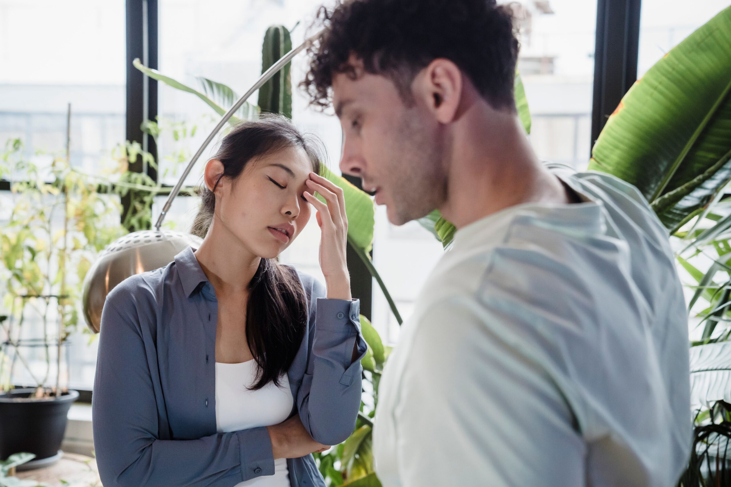Conflict Between Partners - individual relationship counseling for marriage conflict denver co - individual relationship counseling denver co - individual relationship counselor denver co - colorado Couple looking stressed during an argument, representing the emotional reactivity and communication challenges addressed through individual relationship counseling for marriage conflict in Denver, CO.